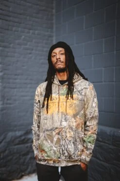 Despised Icon "Russell Realtree Logo Hoodie " Pullover Hoodie -Bandtees Store 67377e7f0b5266054b6bad32e243da87